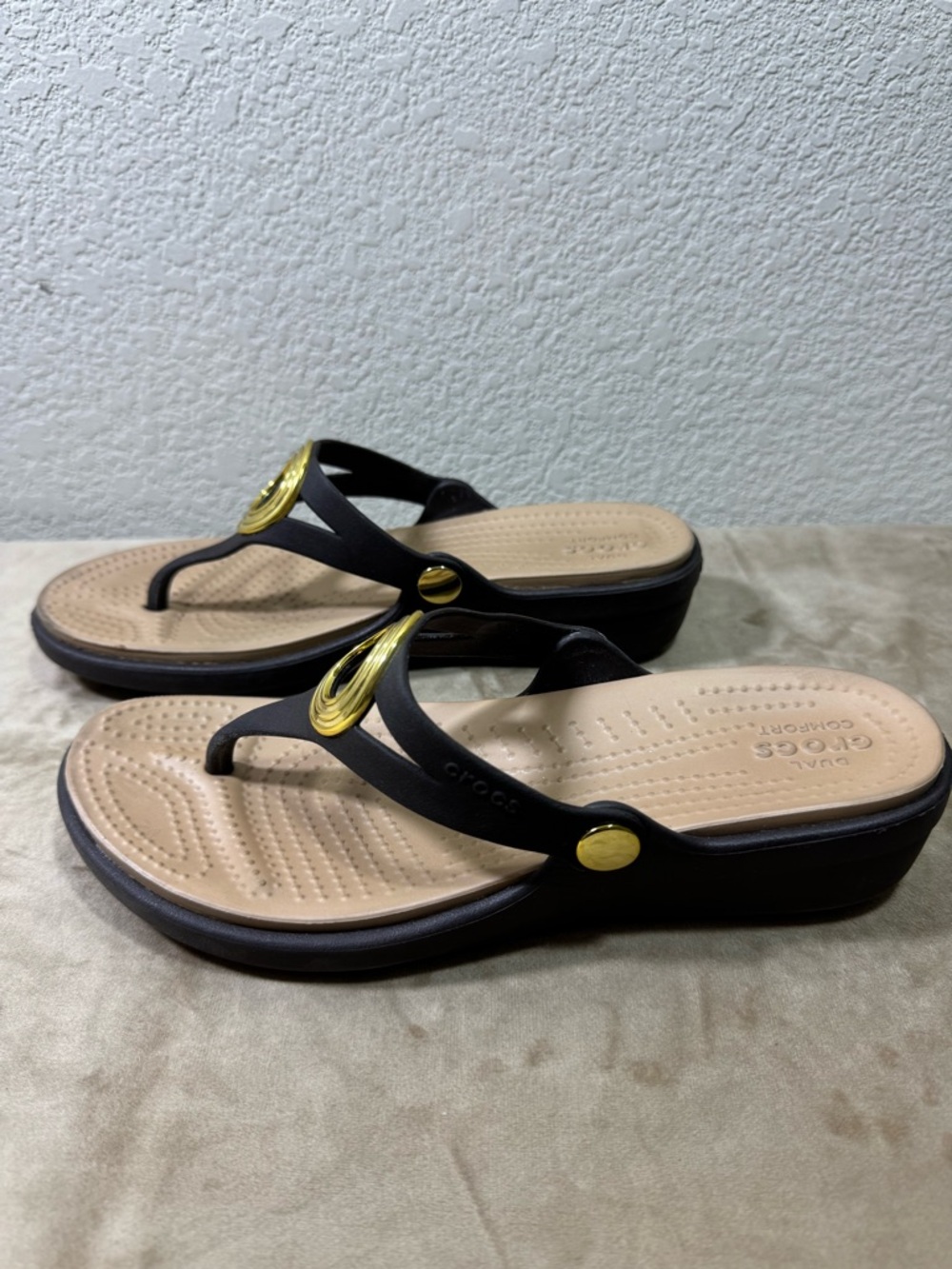 Crocs Black and Tan Women's Wedge Thong Sandals with Gold Accent